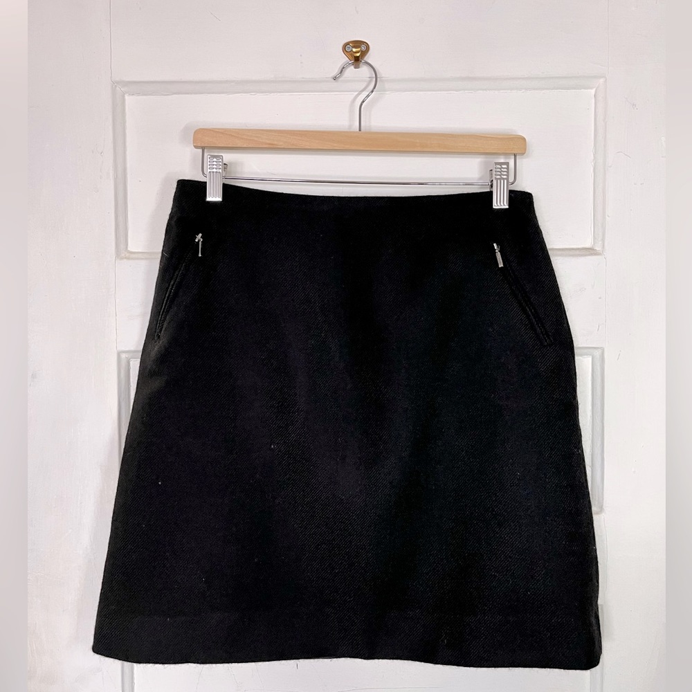 Black wool A-line skirt with pockets